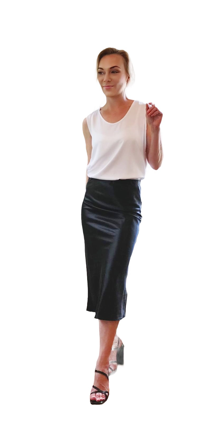 Woman wearing a white sleeveless top and black skirt on a white background