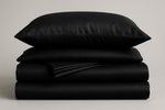 folded black bambo bedding set sheets and pillowcaes